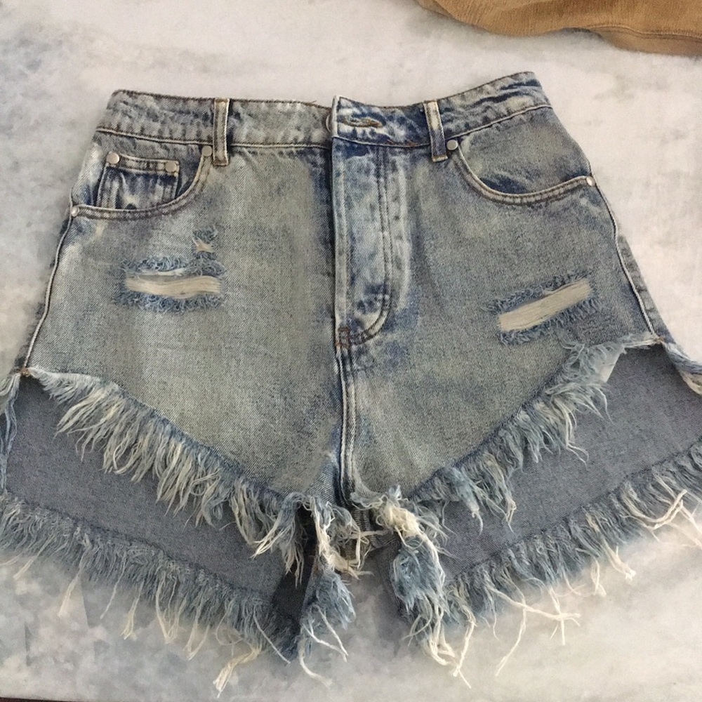 High waisted asymmetrical hem jean shorts